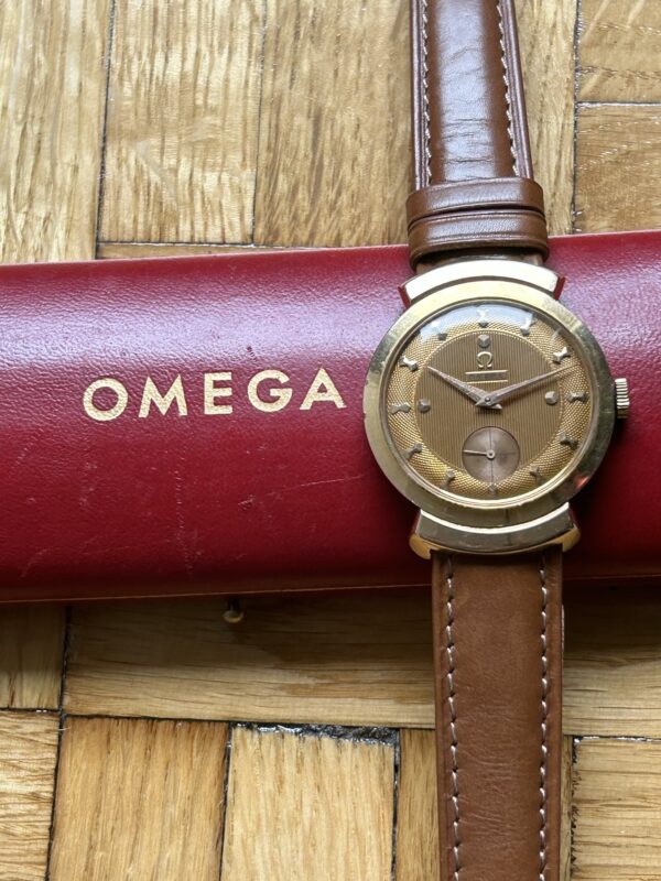 Omega Vintage oro amarillo 18k con pulsera de cuero